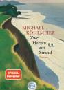 Zwei Herren am Strand Roman